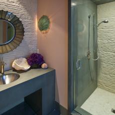 Coastal Bathroom With Shower Enclosed by Green Glass