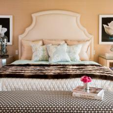 Peach Bedroom With Elegant Cream Headboard