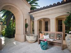 Mediterranean Courtyard With Charming Wooden Bench