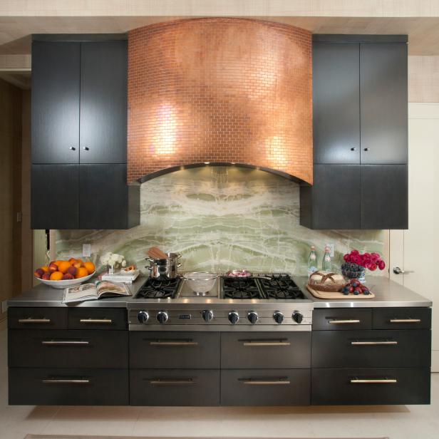 Contemporary Kitchen With Black Cabinets and Copper Range Hood