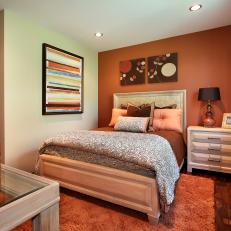 Orange Accent Wall Energizes Transitional Bedroom