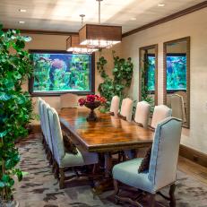 Rustic Dining Room With Built-In Fish Tank