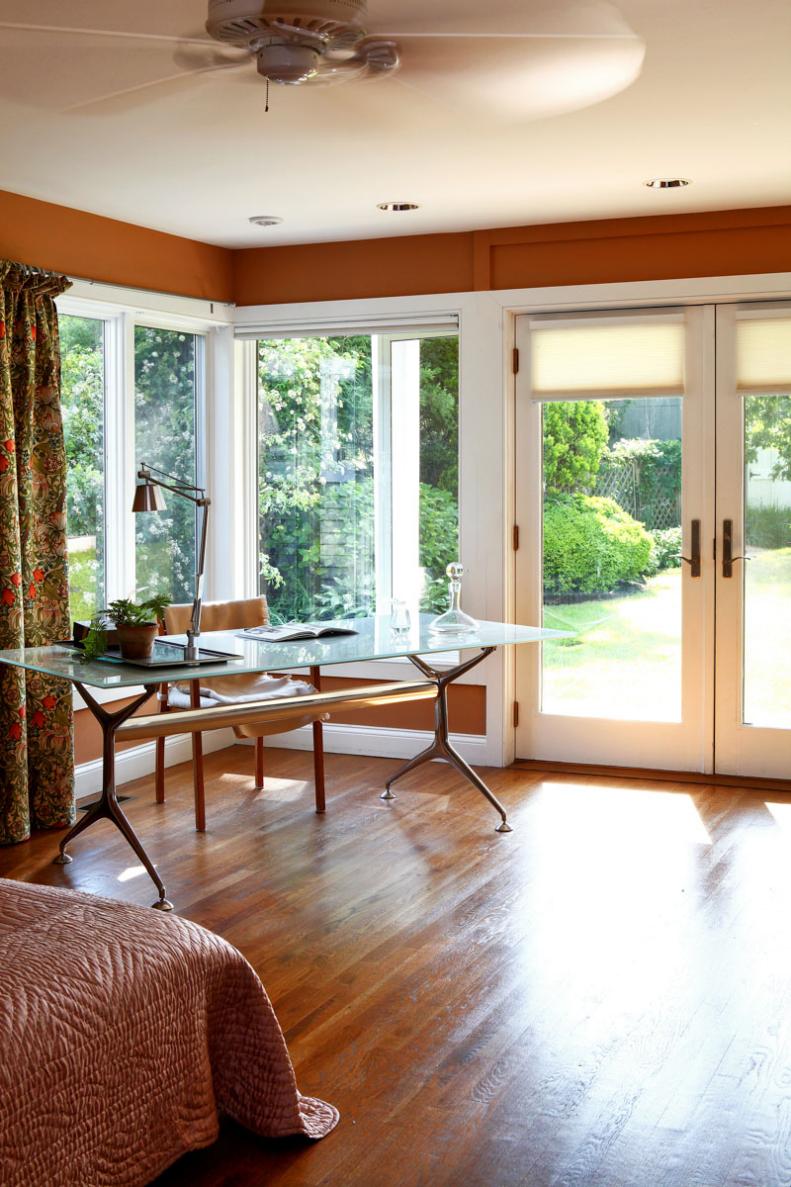 Rust Orange Bedroom with Glass Desk