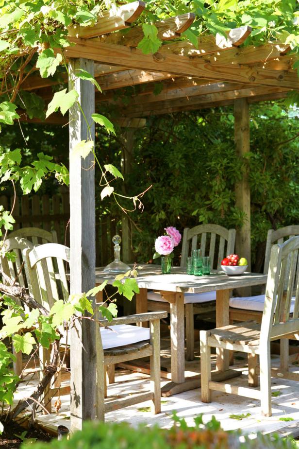 Backyard Dining Area with Pergola | HGTV