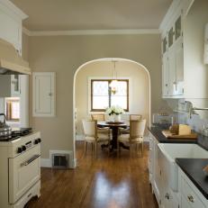 Neutral Cottage Kitchen with Access to Dining Room
