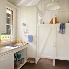 White Country Bathroom With Barn Stall Doors