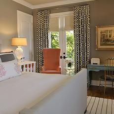 Transitional Master Bedroom With Orange High-Back Accent Chair