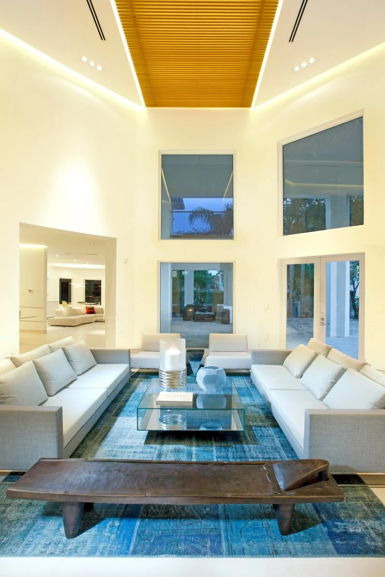 A two-story living room gives the illusion of being underwater