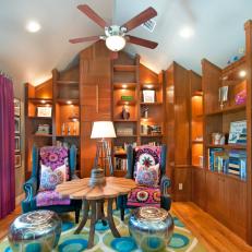 Colorful, Eclectic Home Library Offers Comfy Seating