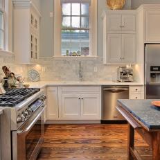 Neutral Transitional Kitchen With Antique Soapstone-Topped Island