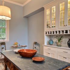 Neutral Transitional Kitchen With Built-In Cabinet and Hutch