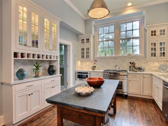 Gray Transitional Kitchen With White Cabinets and Marble Backsplash