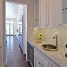 Contemporary Butler's Pantry With White Cabinetry