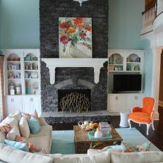 Transitional Aqua Living Room With Gray Stone Fireplace