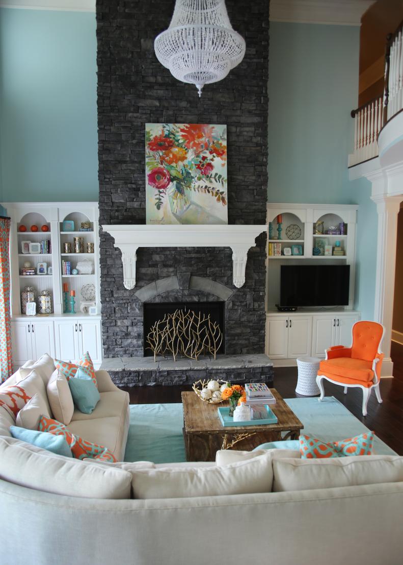 Light Blue Transitional Living Space With Charcoal Fireplace