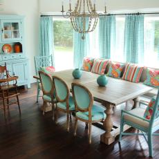 Coastal Dining Room With Bright Aqua Furnishings