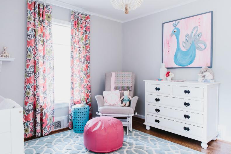 Gray Transitional Nursery With White Chest and Floral Curtains