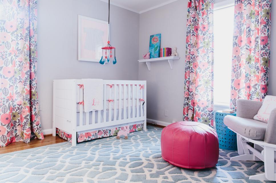 Gray Transitional Nursery With White Crib and Colorful Floral Curtains
