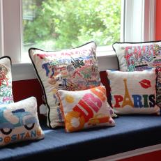 Colorful Global Pillows Fill Navy and Red Window Seat