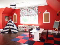 Red Playroom With Navy and White Striped Tent and Checkered Rug