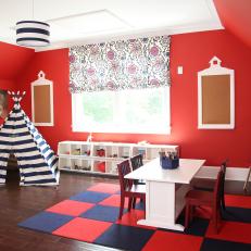 Bold Red Playroom With Navy and White Accents