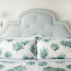 Transitional Bedroom With Blue Upholstered Headboard