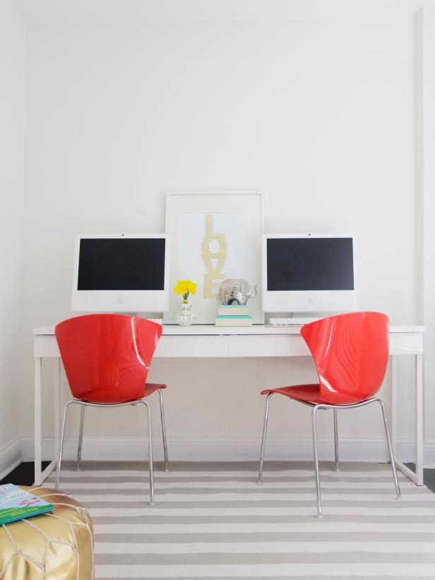 Mod White Home Office With White Desk, Red Chairs and Striped Rug