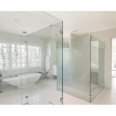 Frameless Glass Doors in White Modern Spa Bathroom