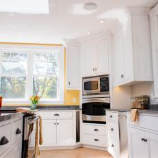 Transitional Yellow Chef's Kitchen With White Cabinets