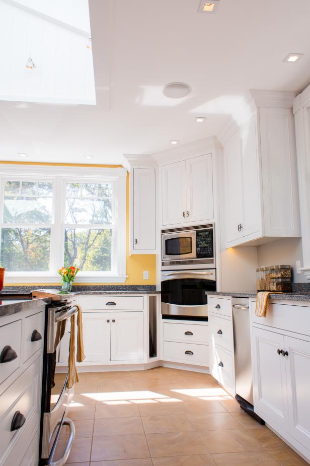 Transitional Yellow Chef's Kitchen With White Cabinets | HGTV