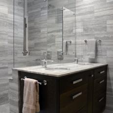 Glass Shower Wall Is Vanity Backsplash in Modern Gray Bathroom
