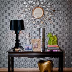 Eclectic Living Room Nook With Table and Starburst Mirror