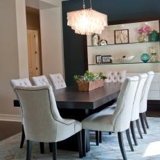 Blue Transitional Dining Room With Eye-Catching Chandelier