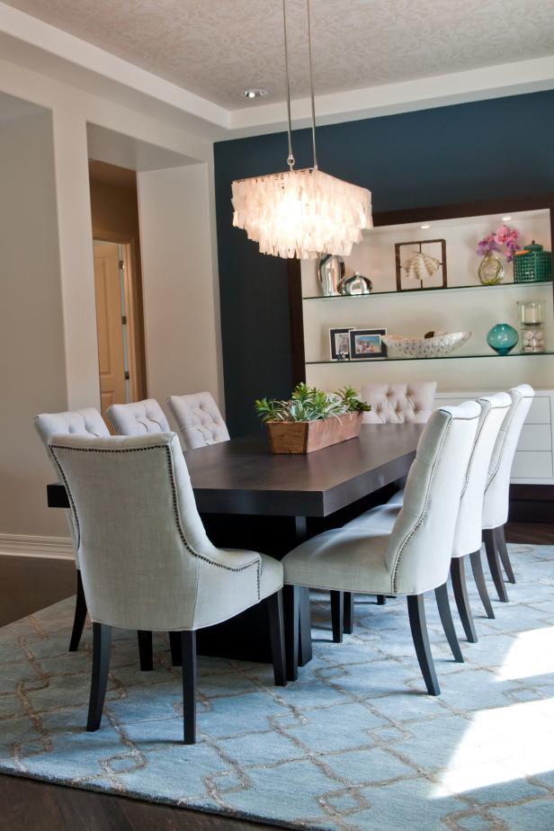 Blue Transitional Dining Room With Eye-Catching Chandelier 