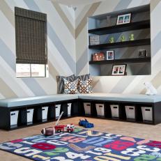 Kid's Playroom With Built-In Storage for Toys and Games