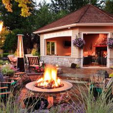Transitional Patio Features Fire Pit and Ample Seating