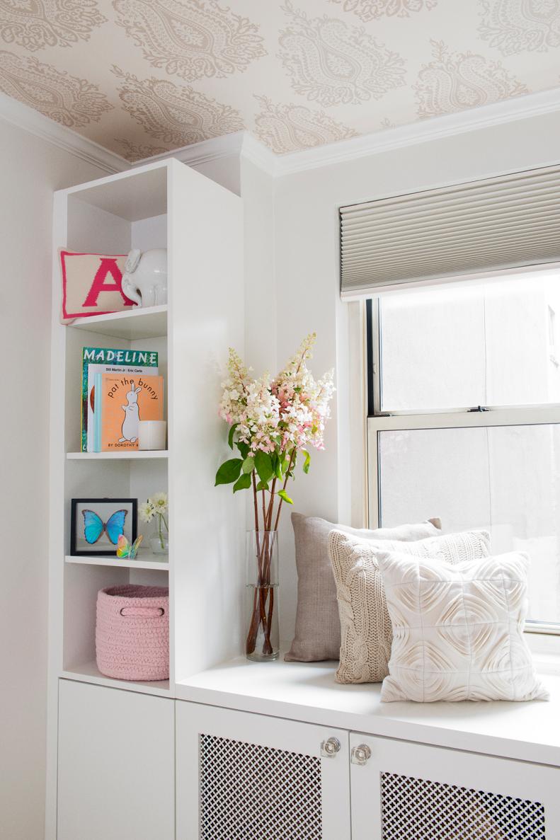 Transitional Neutral Nursery With White Built-In Shelf