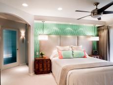 Contemporary Master Bedroom With Arched Doorway & Aqua-Blue Focal Wall