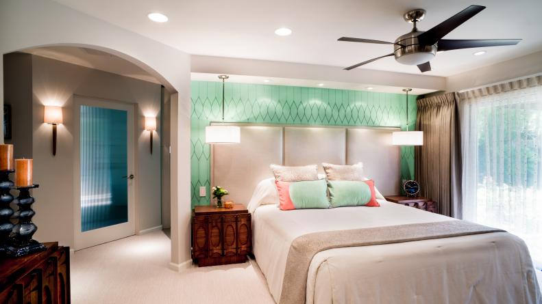 Contemporary Master Bedroom With Arched Doorway & Aqua-Blue Focal Wall