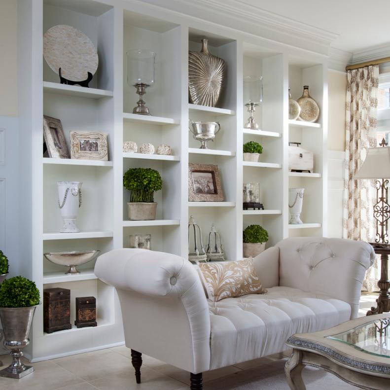 Traditional Sitting Room With White Built-In Shelving