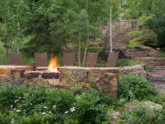Stone Retaining Wall In Front of Fire Pit Patio