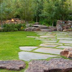 Stone Paver Walkway Trimmed With Green Grass