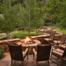 Rugged Fire Pit With Rocking Chairs