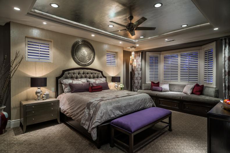 Transitional Neutral Master Bedroom With Silver Bedding & Purple Bench