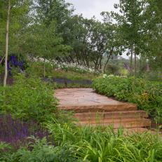 Lush Garden Features Charming Stone Walkway