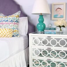 Purple Kids' Bedroom With Mirrored Dresser