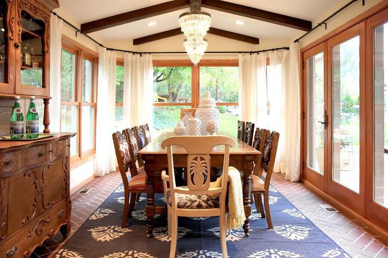 Neutral Sunroom Turned Large Transitional Dining Room
