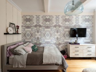 Studio Bedroom With Patterned Wallpaper and Soft Cream Walls