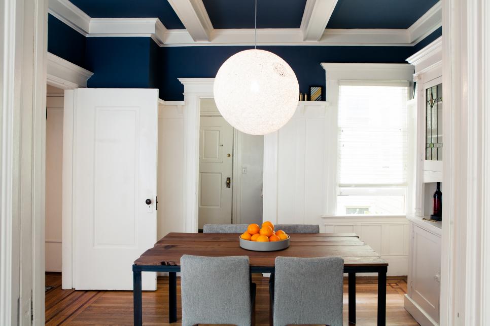 Navy Dining Room With White Wood Work, Large Globe Pendant