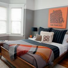 Transitional Bachelor Pad Bedroom With Orange Accents